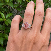 3 stone oval engagement ring with elegant diamond setting