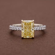 yellow radiant cut diamond ring with pave diamond band 