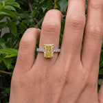 yellow radiant cut diamond ring with pave diamond band 