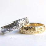 Elegant 18K gold couple ring set with matching design, perfect for love and commitment.